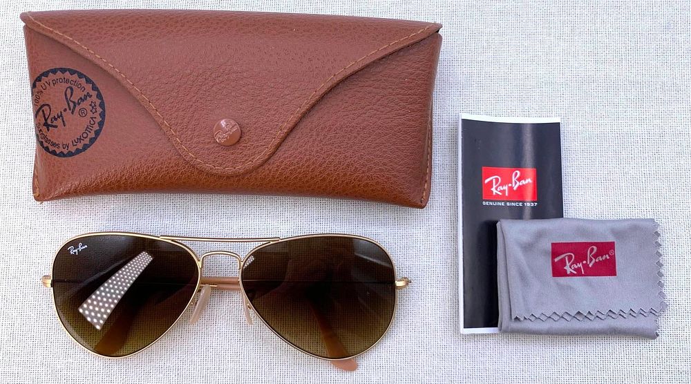 Lot 232: Italian Made Ray-Ban Matte Gold Aviator Sunglasses with Gradient Brown Polarized Lenses and Case