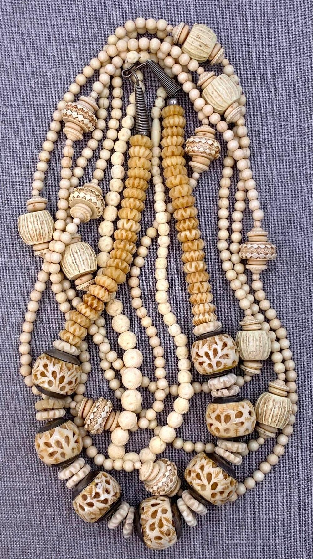 Lot 279: 4 pc Vintage Pierced and Carved Natural and Created Necklace Collection