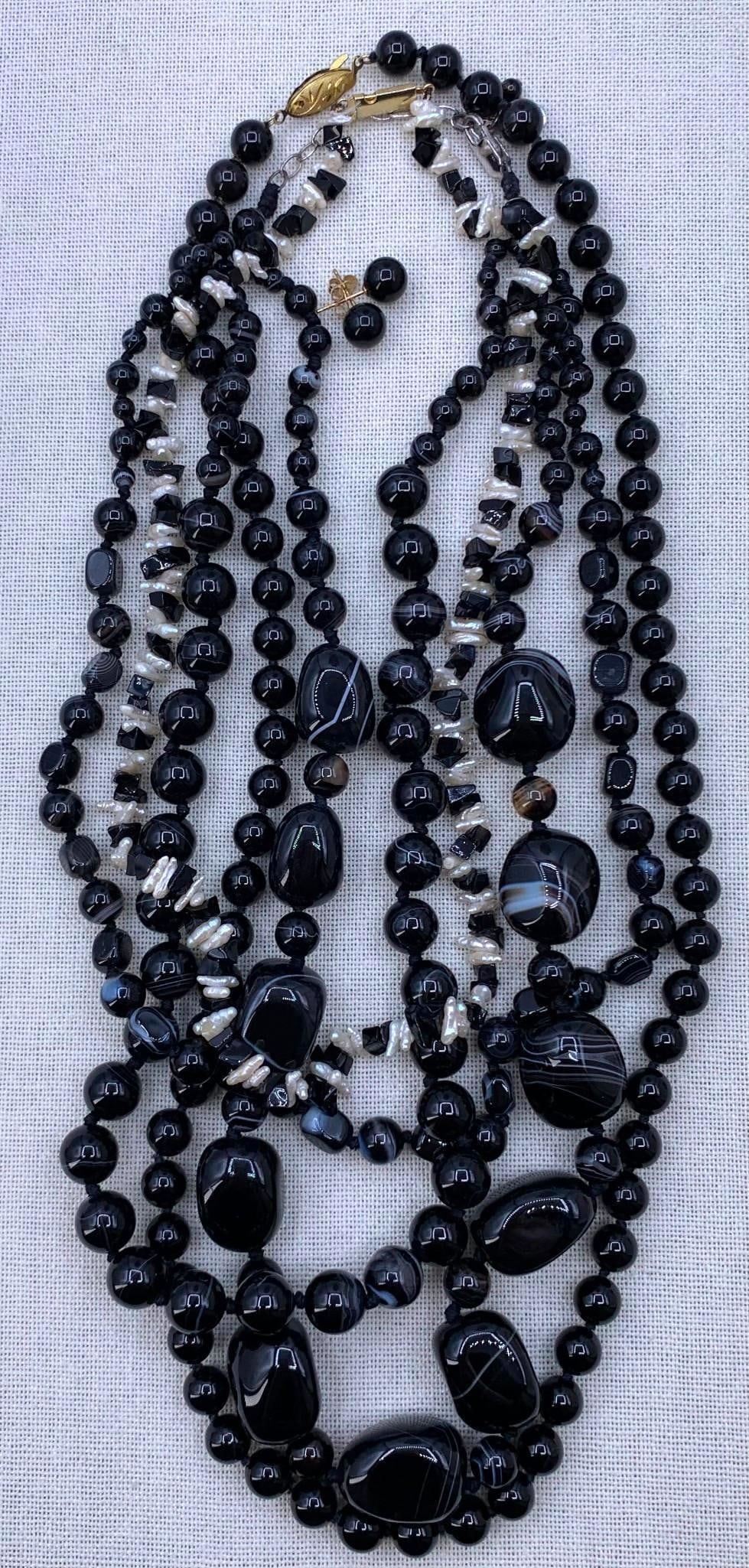 Lot 288: Gothic Banded Agate, 14k Gold, Sterling Silver, Black Onyx, Freshwater Pearl Jewelry Collection