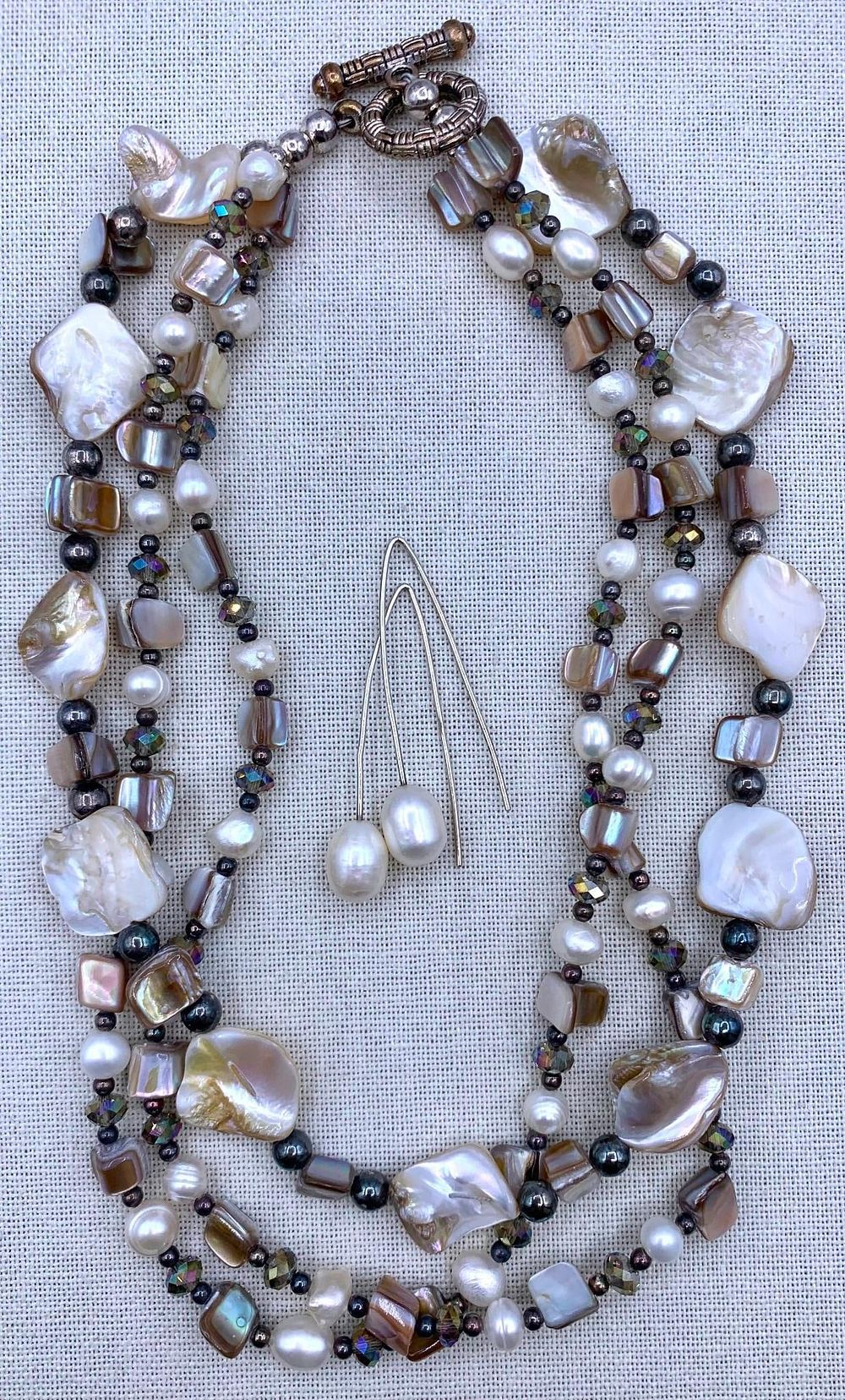 Lot 365: Superb Triple Strand Freshwater Pearl, MOP, Silver Bead Necklace and Baroque Pearl Sterling Earrings