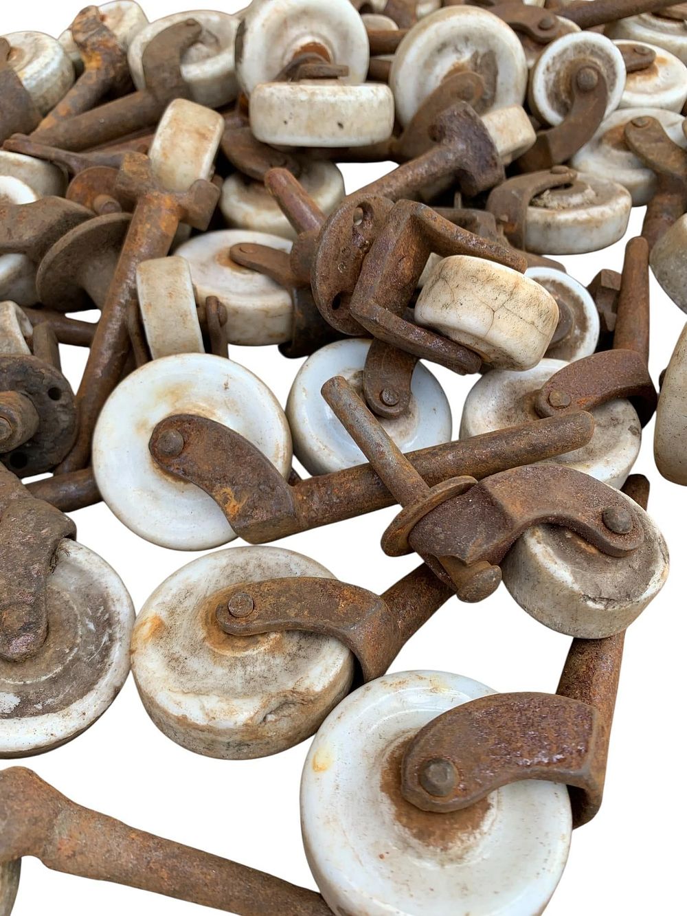 Lot 402: 88 pc Antique White Porcelain Wheels Collection