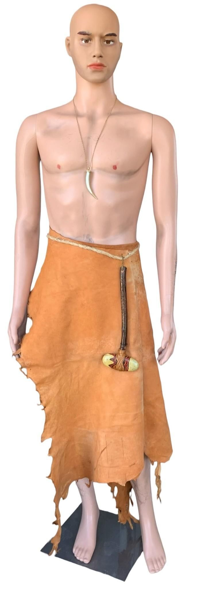 Lot 412: Adult Size Male Mannequin with Metal Base, Tanned Hide, Painted Stone Weapon and Faux Fang Necklace