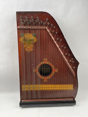 Oscar Schmidt 1915 Panama Harp Zither. A 19-string fretless guitar zither, also referred to as a 