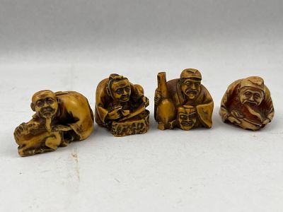 4 Carved Boxwood Netsuke. Height: 1 to 1.25 inches (approximately 2.5 to 3.2 cm). A group of 