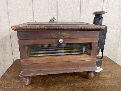Geo H Stahl Wooden Hen Egg Incubator. A late nineteenth-century tabletop egg incubator, marketed 