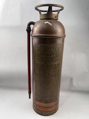 Essanay Copper & Brass Extinguisher. 24 inches tall. An American-made cylindrical fire 
