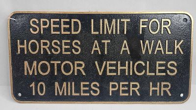 Cast Iron Horses & Motors Speed Sign. 8 x 16 in. A heavy cast iron rectangular wall sign 