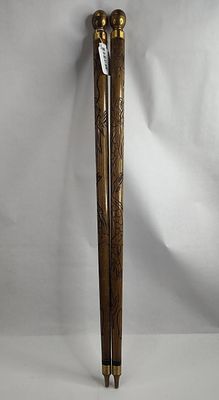 Pair Hand Carved Wood Hidden Pool Canes. A pair of wooden system canes that function as 