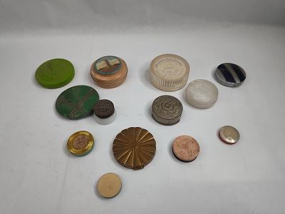 Rubinstein & Bourjois Vanity Set. Cosmetic containers and vanity items featuring varied 