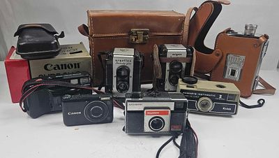 Canon, Argus & Kodak Cameras & Acc. Cameras and photographic equipment from various eras. The 