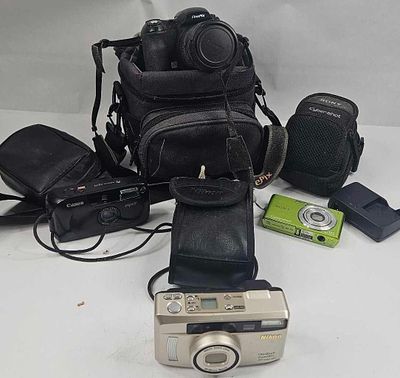 Nikon, Fuji, Sony & Canon Camera Lot. An assortment of five film and digital cameras with 