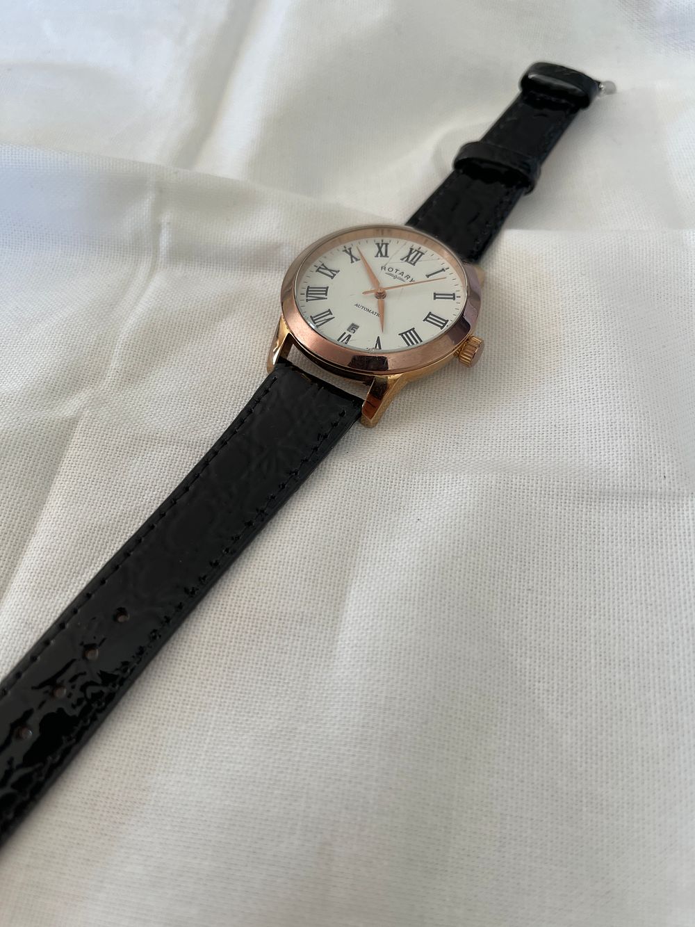 Lot 167: Rotary Automatic watch gold plated with black new strap this watch is a return from a main agent, it is working but not fully tested. Estimated price £140
