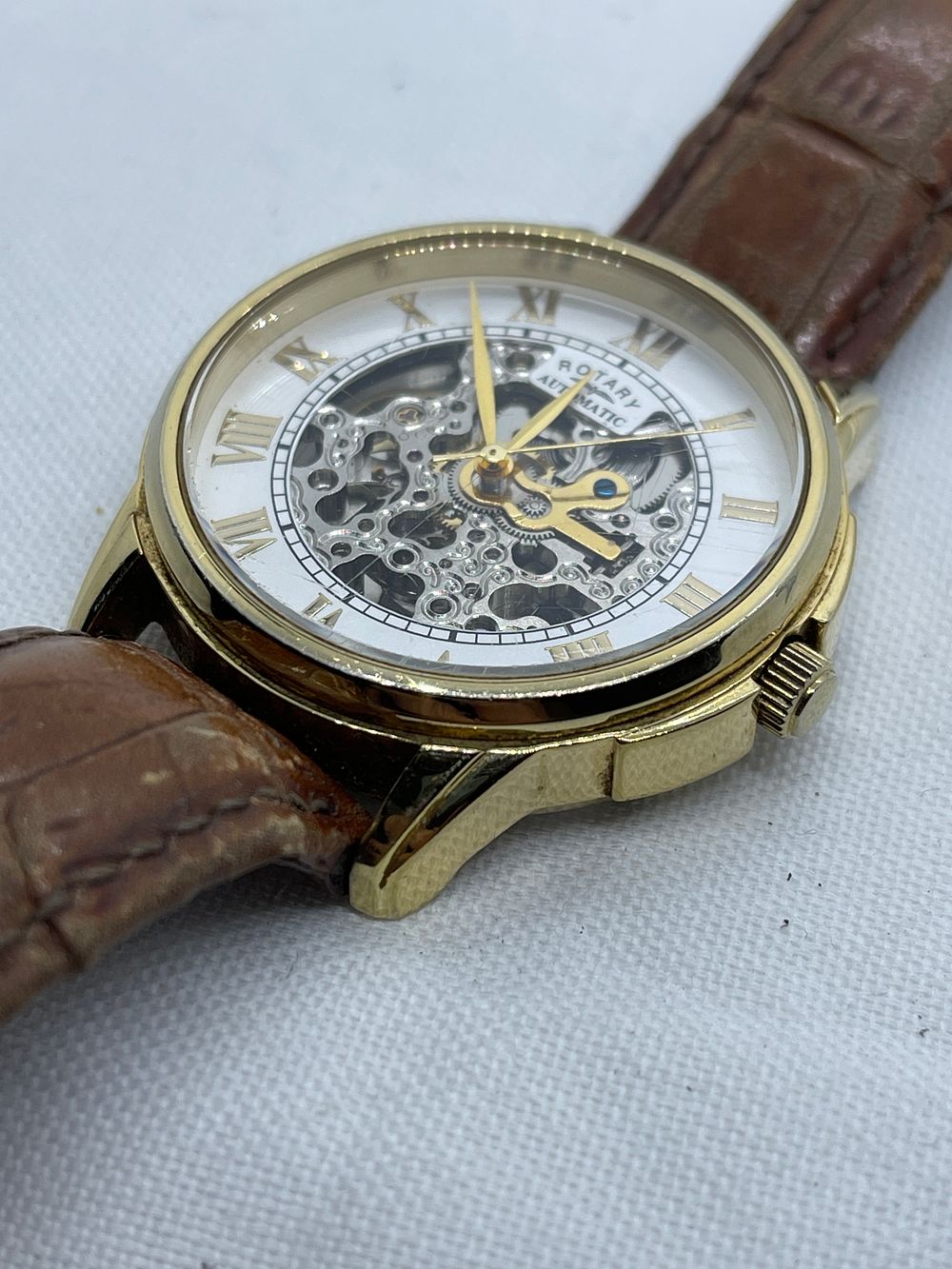 Lot 177: Rotary return from a main agent skeleton automatic men’s watch sold as spares or repairs
