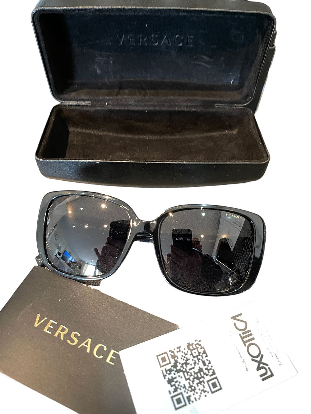 Lot 197: Versace large black frame ladies sunglasses ex demo or end of line stock.
