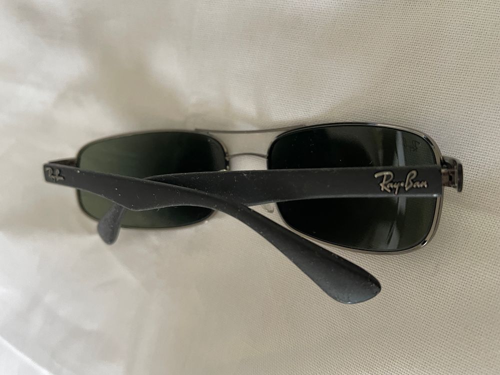 Lot 200: Ray Ban wrap around sunglasses, lost property from a private jet charter.