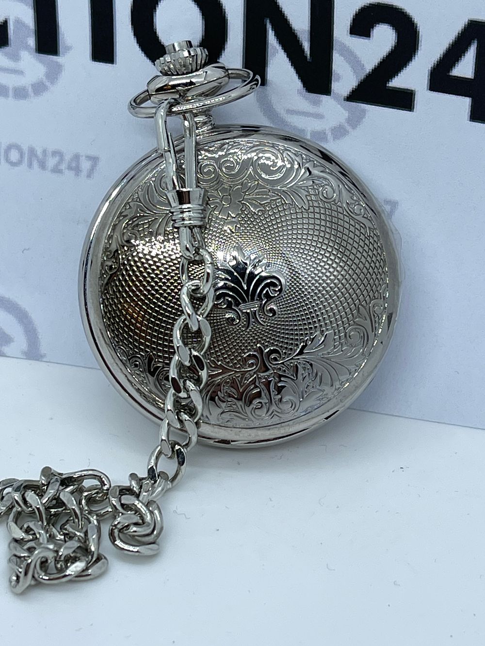Lot 203: Rotary mechanical pocket watch half hunter with chain, box and papers, fully working this is a prototype, it's a one off.