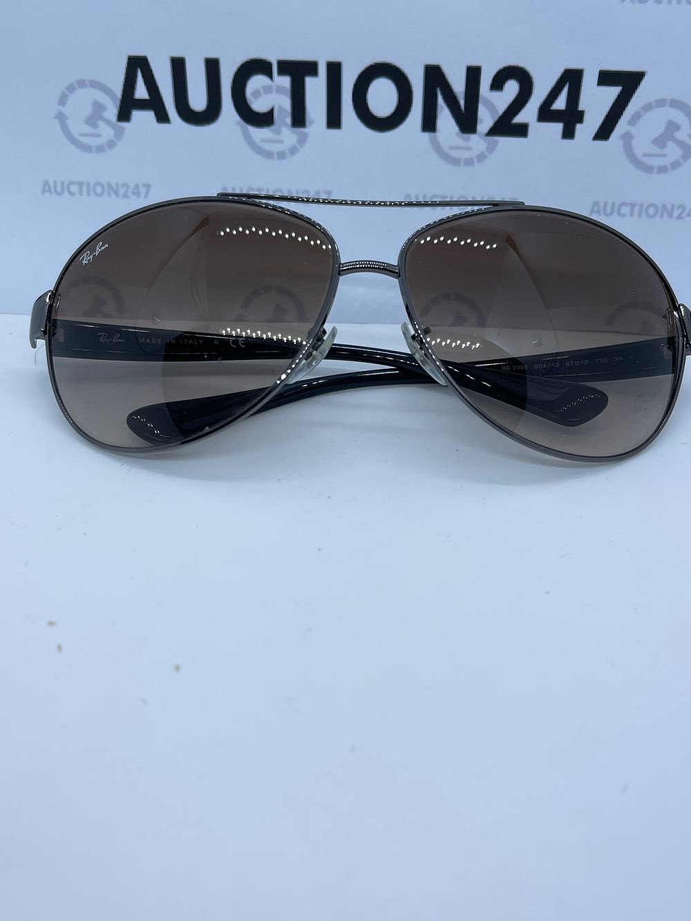 Lot 204: Rayban aviator sunglasses like new, graduated tint lenses with case this was ex demo from private jet charter.