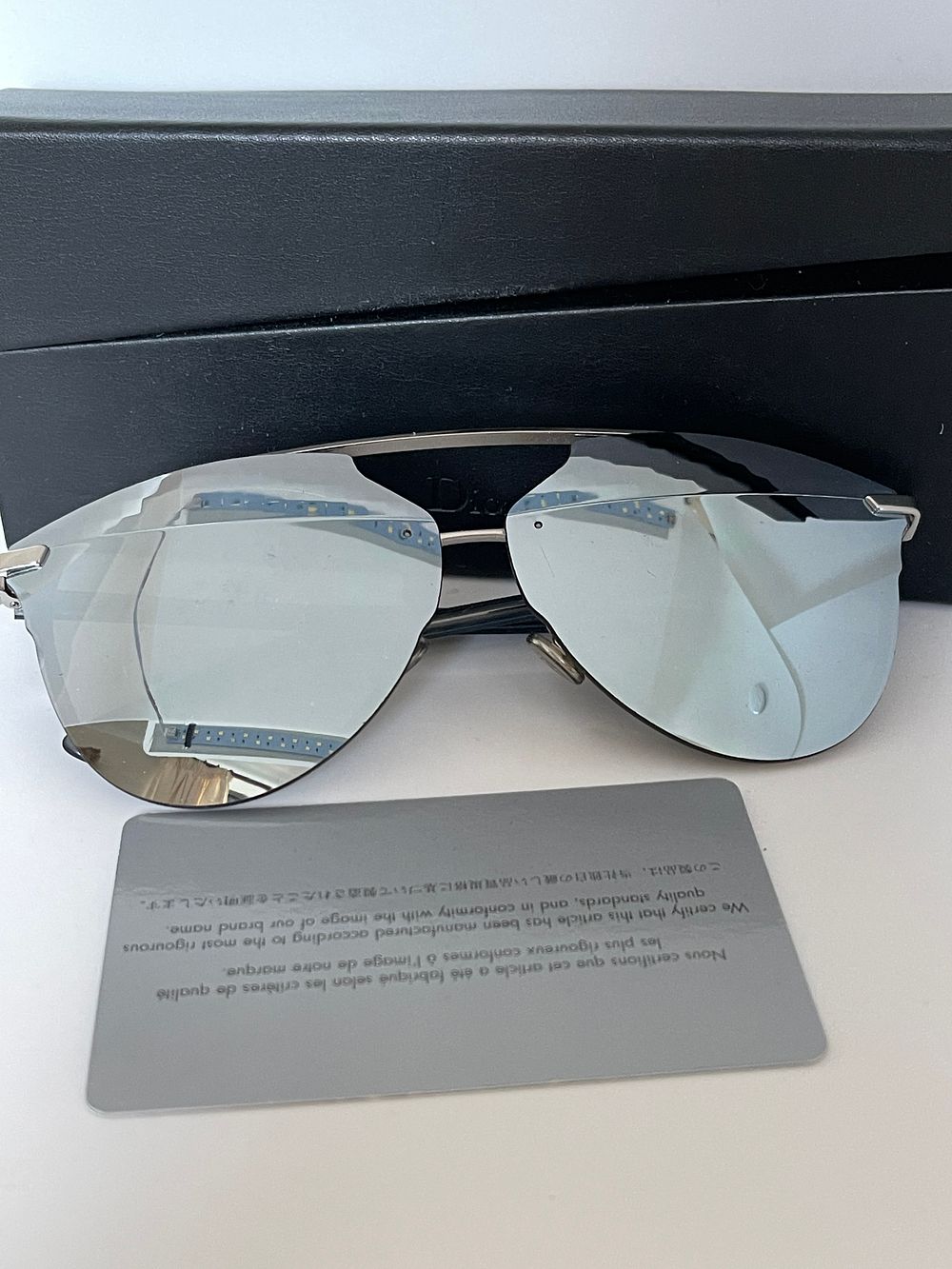 Lot 151: Dior unisex sunglasses with box papers ex demo from a private jet charter
