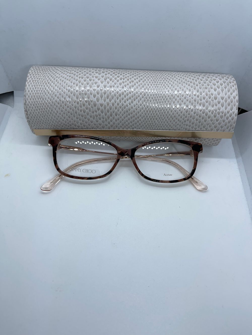 Lot 152: Jimmy Choo glasses frames,  ex demo from a private jet charter, with case for condition please look at photos
