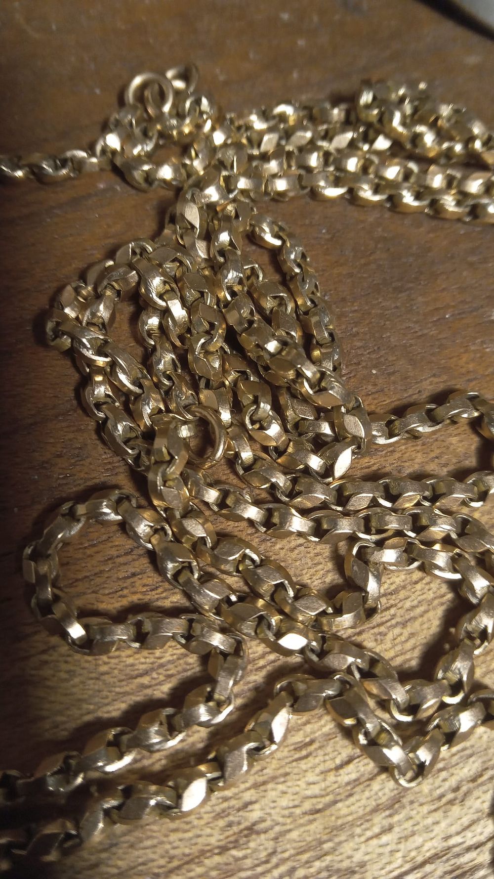 Lot 175:  Victorian 1870 circa hand made long guard chain with the original seal still in 9 ct solid gold