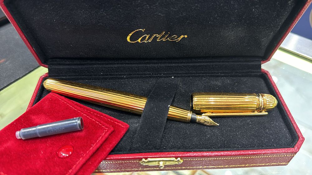 Lot 181: Cartier Solid gold fountain pen 100 percent original. just been serviced.18k