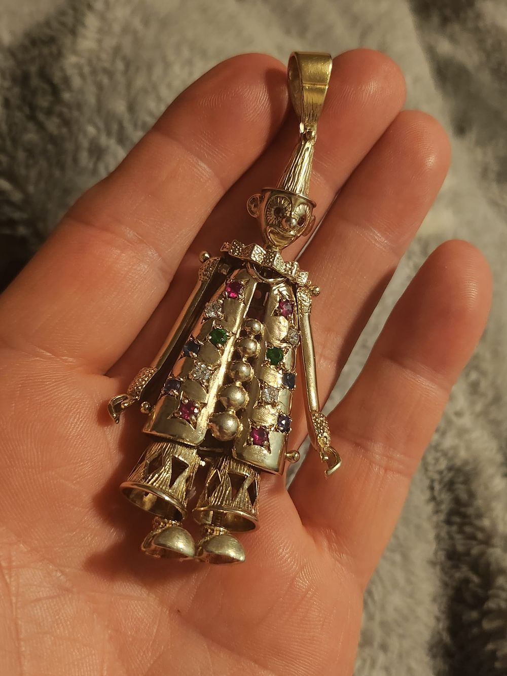 Lot 187: Fully hallmarked 925 silver articulated clown rag doll with gem stones and 18ct gold plated