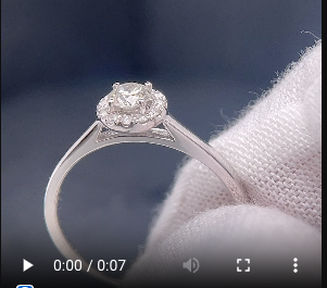 Lot 270: 9ct White Gold Halo Diamond Ring 0.20ctJ K L M N O P