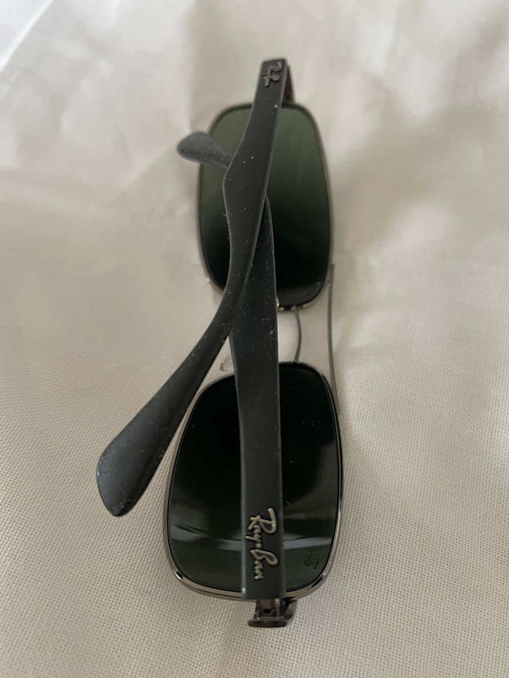 Lot 317: Ray Ban wrap around sunglasses, lost property from a private jet charter.