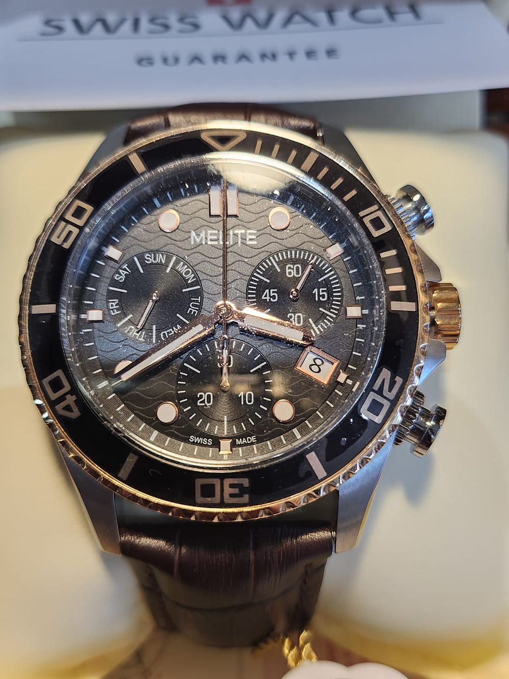 Lot 355: watch brown leather strap. And comes in a gorgeous brown wooden box.. all paper aswell