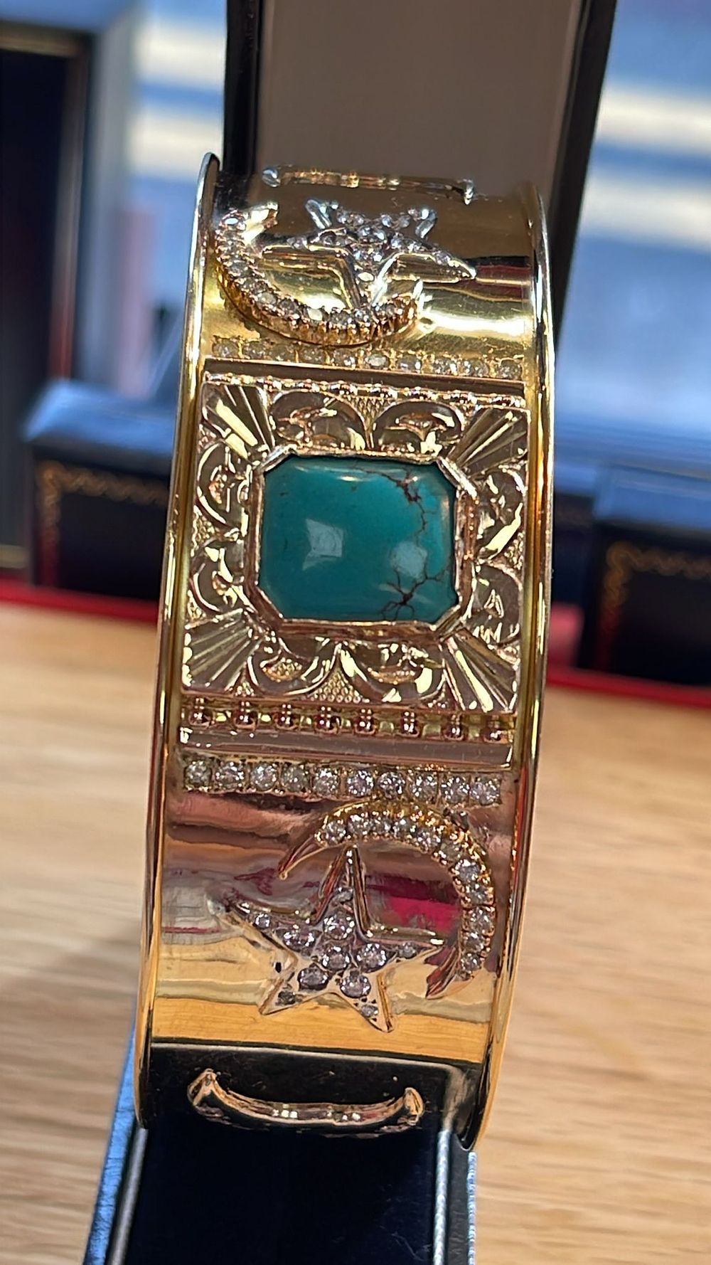 Lot 358: 18ct handmade stars and moon gents bangle weight 106.2 grams set with excellent quality diamonds sapphires M.