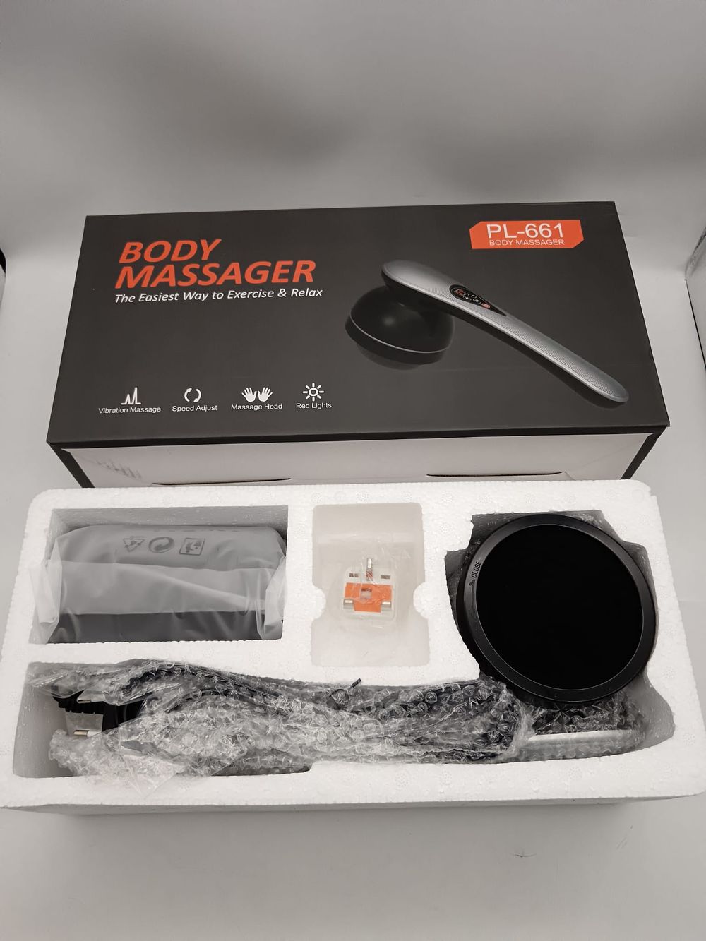 Lot 195: Body massager with 7 massage attachments