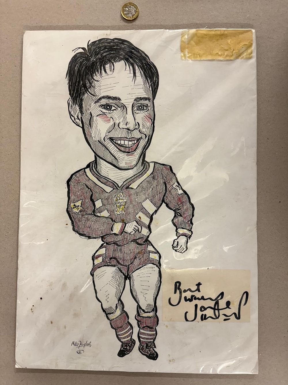 Lot 23: An Original cartoon artwork by Mike Taylor of Jamie Redknapp
provided with a signature card of Best Wishes Jamie Redknapp