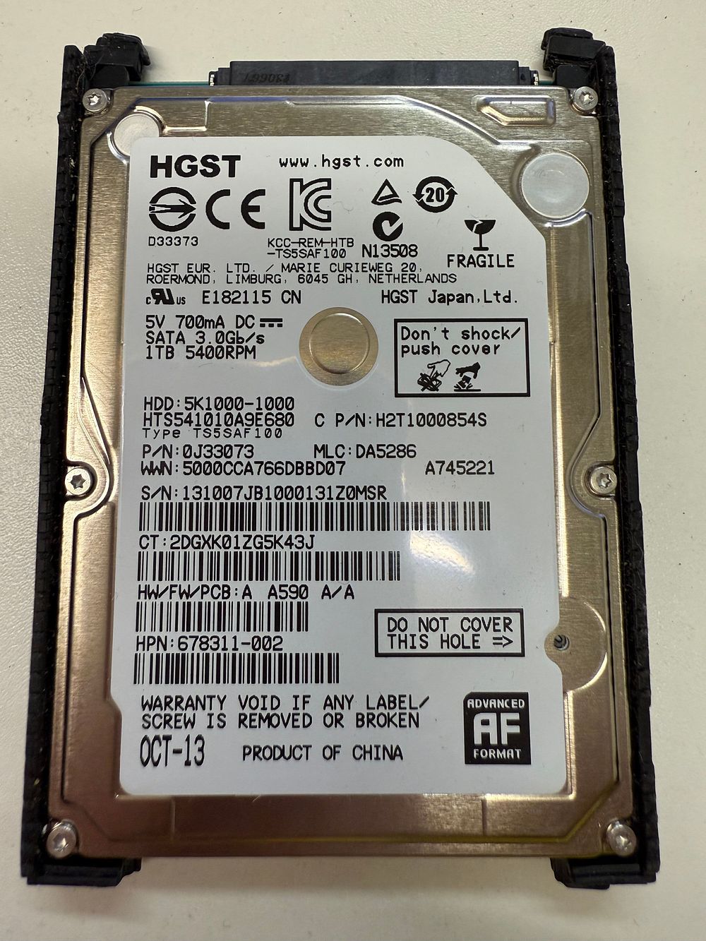 Lot 43: HGST 1TB SATA 3.0 Gb/S HARD DRIVE