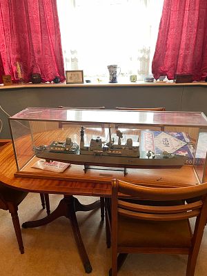 Battleship working model with motor. and display case handmade.HMS Sheffield the procced will 