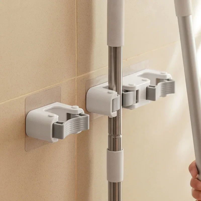 Lot 154: Self-adhesive Mop Holder Clips Wall Mounted Mop Brush Broom Stand Rack Space Saving for Kitchen Bathroom Organizer Accessories