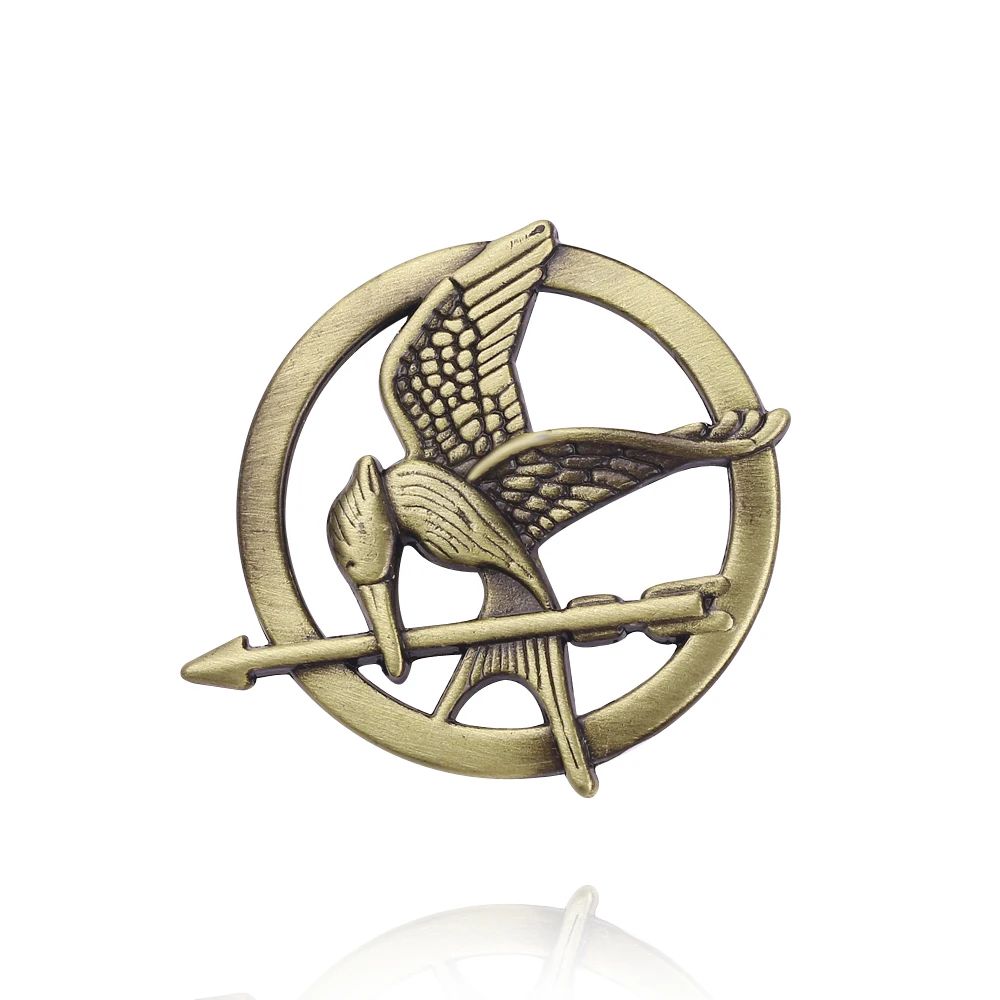 Lot 164: The Hunger Games Metal Brooch Jewelry Accessories Circular Shape Vintage Punk Style Mockingjay Badge Lapel Pins for Women
