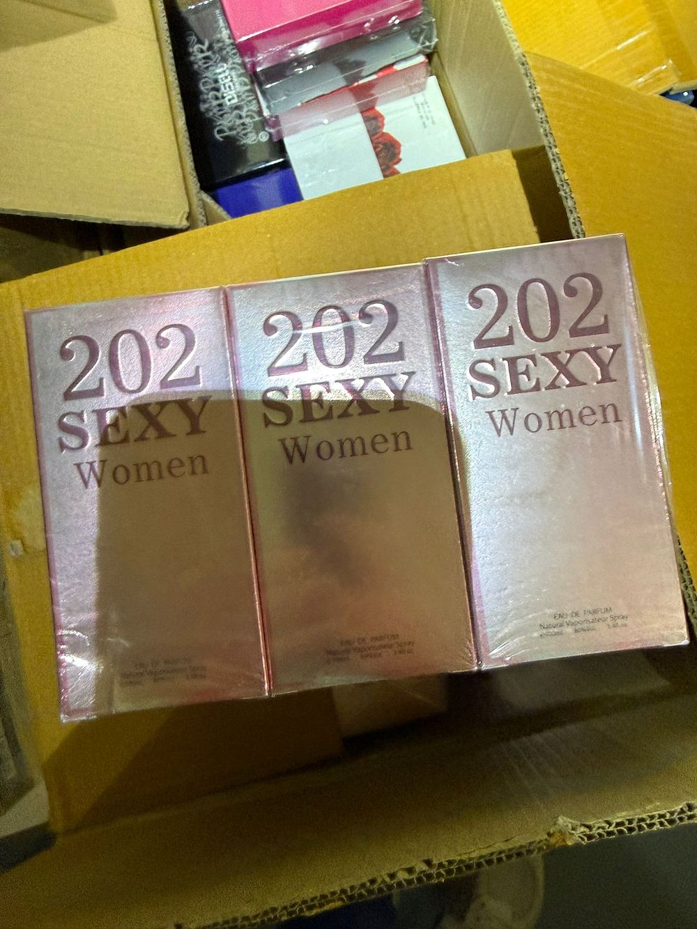 Lot 174: Bulk Box of 202 Sexy Women Eau De Parfum 100ml – Female Fragrance – Sealed Units