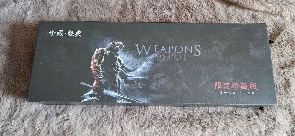Lot 1127: metal weapon models based on the Ninja Gaiden video game series.