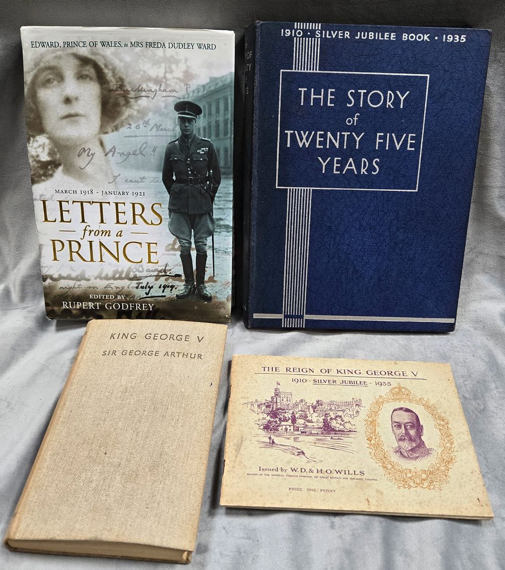 Lot 1286: King George V - Three picture books and a complete cigarette card album with 50 colour cards