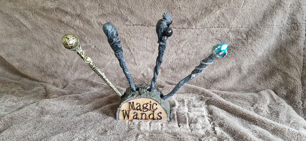 Lot 20: Magic Wand Stand and wand set.