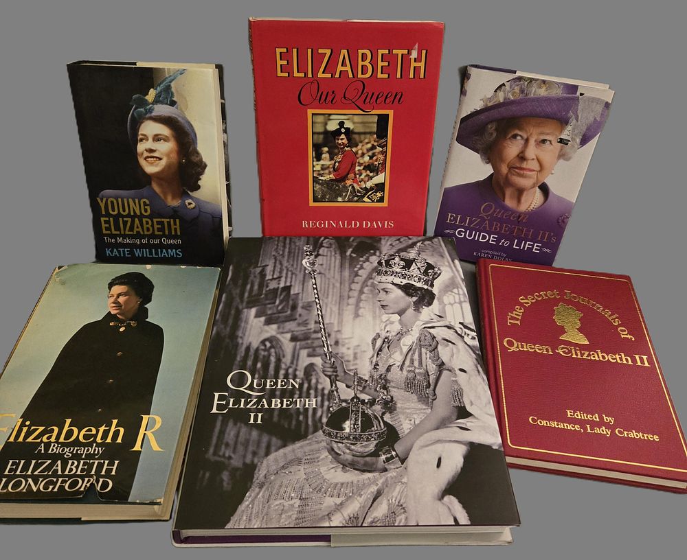 Lot 114: A hardback collection of books focused on Queen Elizabeth II.