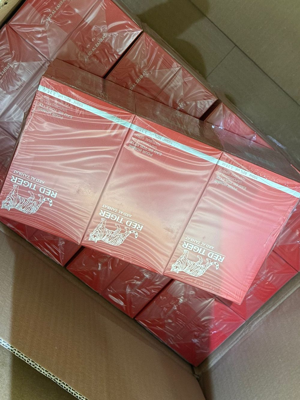 Lot 78: Bulk Box of Red Tiger Eau De Parfum 100ml Inspired Fragrance Sealed Units