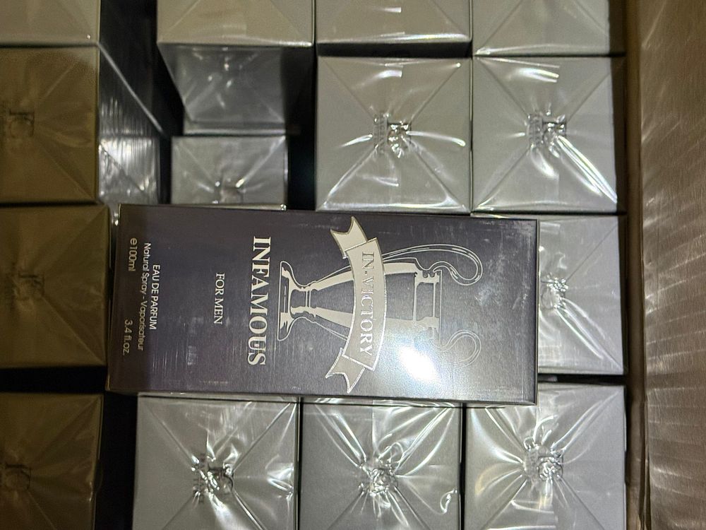 Lot 121: Bulk Box of Infamous / In Victory Eau De Parfum 100ml Mixed Fragrance Sealed Units