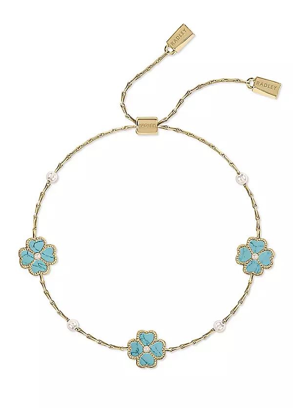Lot 302: Radley 18ct GP Teal Cord Friendship Bracelet
