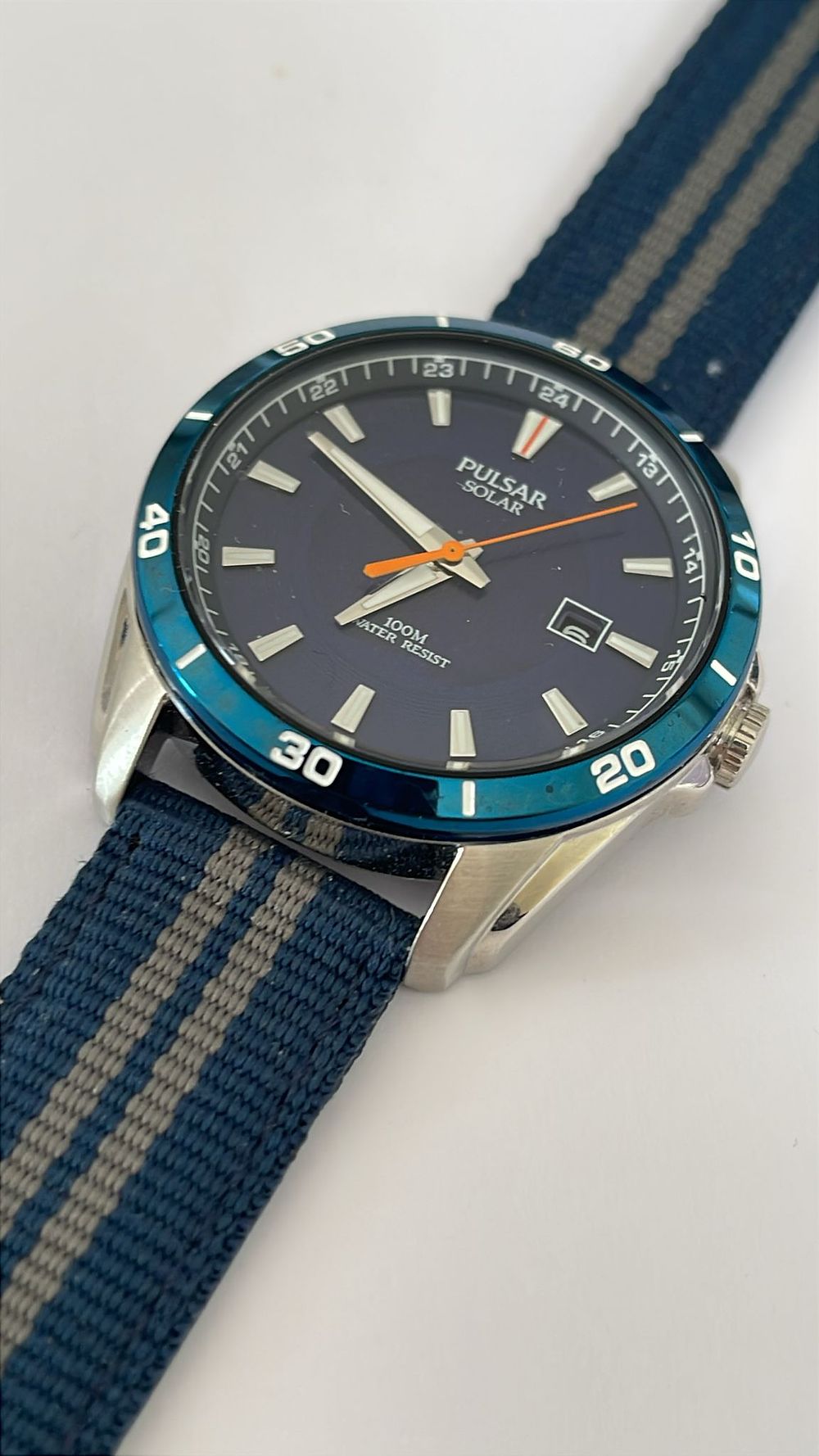 Lot 414: Pulsar Solar Wristwatch Blue Dial Stainless Steel Case Modern Design