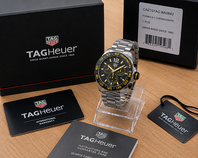 TAG Heuer Formula 1 Chronograph Watch Black Dial Yellow Accents Box & Tags. Description 
Premium 