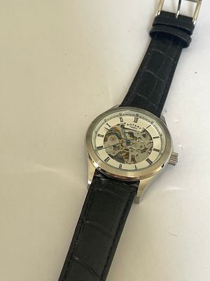 Rotary Men's Skeleton Automatic Wrist Watch. A Rotary skeleton wrist watch featuring a 