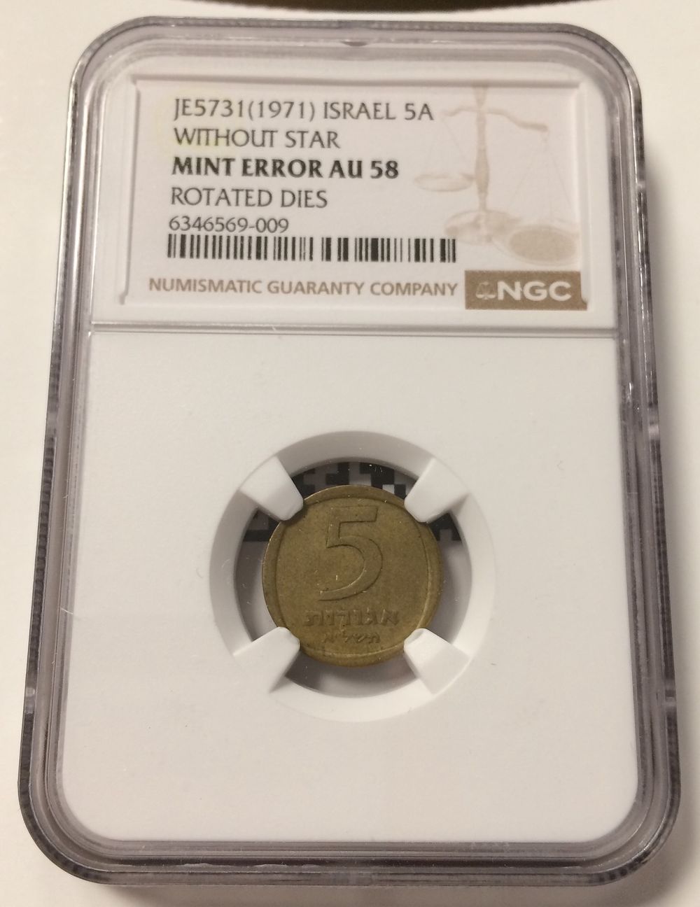 Israel , Coin with rotated dies Error , Almost coin alignment in 5 agorot 1971 graded by NGC AU 