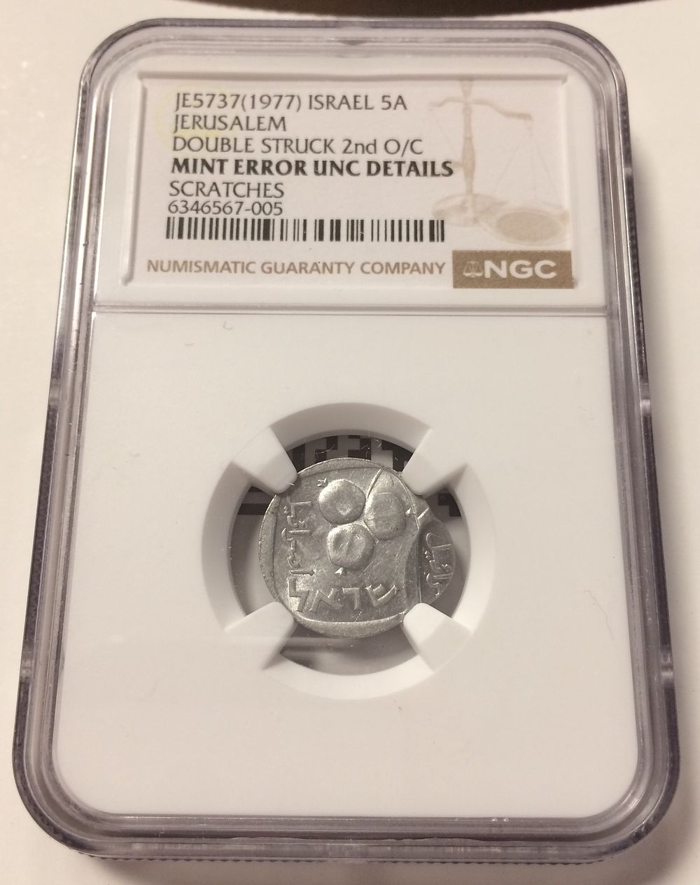 Israel , Coin with Double struck Error in 5 agorot 1977 aluminum graded by NGC UNC SCRATCHES