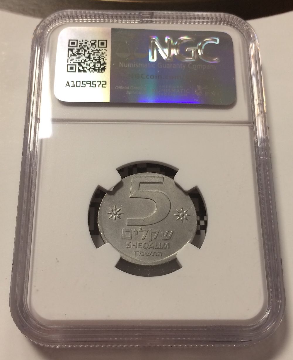 Israel , Coin with Error in 5 sheqalim 1984 made from aluminum and not brass, 
high chance the 